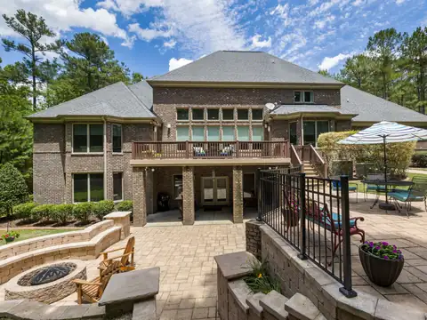 Terrace with a fire pit and seating seen from above